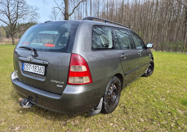 Toyota Corolla cena 7500 przebieg: 311000, rok produkcji 2003 z Strzelce Opolskie małe 121